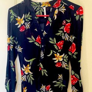 Pretty DNA brand fairly sheer top.